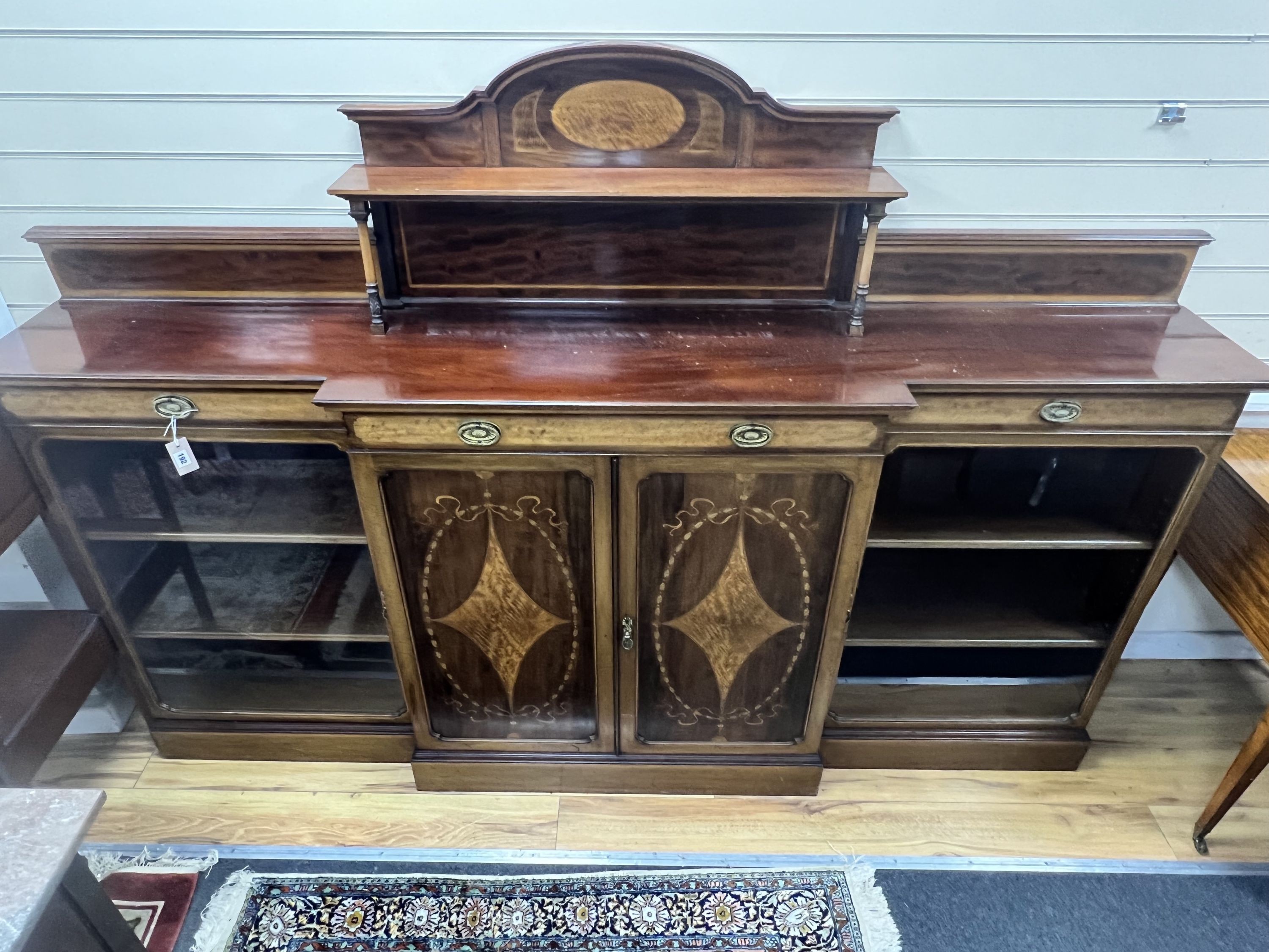 An Edwardian marquetry inlaid mahogany breakfront side cabinet, width 227cm depth 39cm height 155cm